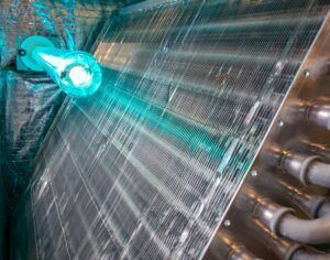 HVAC evaporator coil with UV light