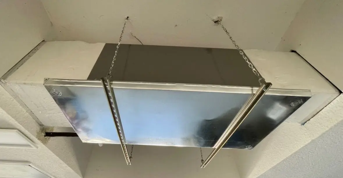 HVAC ductwork installation in the ceiling of a residential home, ensuring efficient airflow for cooling and heating.